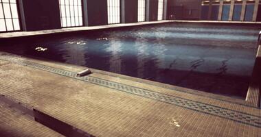CGI Indoor swimming pool with tiled edges and reflections on the water surface video