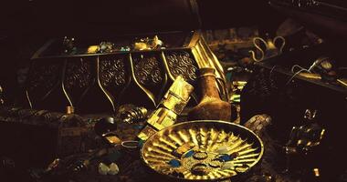 CGI Treasure chest filled with jewels and artifacts in a dimly lit setting video