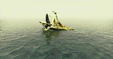 CGI Mysterious rock formation emerges from calm waters in misty atmosphere video