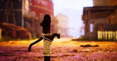 CGI Rustic western landscape with a tied stick in a dusty old town during sunset video