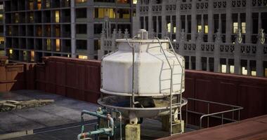 CGI Water cooling system on a rooftop in an urban setting at night video