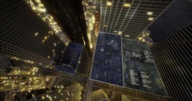 CGI City skyline at night with aerial view of rooftop structures and lights video