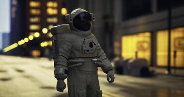 CGI Astronaut exploring an urban environment during twilight in a futuristic city video
