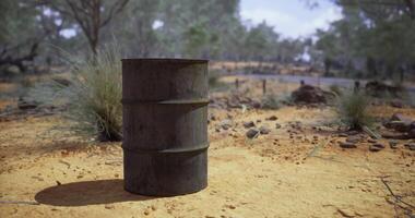 CGI Rusty barrel standing alone in an arid landscape during daylight hours video