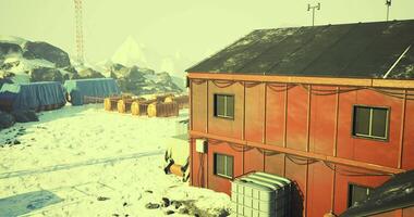 CGI Research facility situated in a snowy mountain landscape during daylight hours video