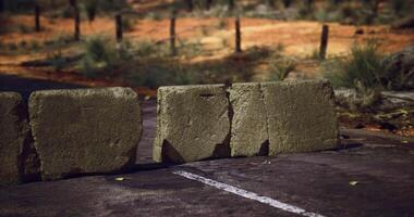 CGI Traffic barrier blocks placed on a deserted road in a remote location video