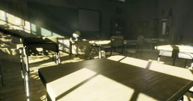 CGI Bright classroom with chairs and desks illuminated by sunlight in afternoon video