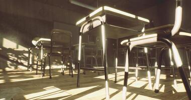 CGI Classroom with empty chairs and sunlight streaming through the windows video