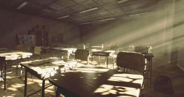 CGI Sunlight streaming through an empty classroom with scattered desks and chairs video