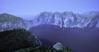 CGI Majestic mountain landscape with calm waters at dawn in serene environment video