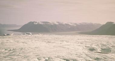 CGI Aerial view of Greenlands stunning glaciers and distant mountains video
