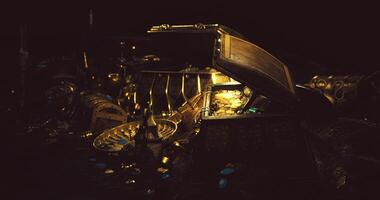CGI Treasure chest filled with gold coins and jewelry gleams in dark setting video