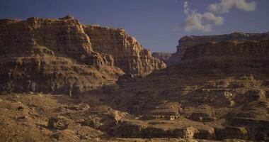 CGI Exploring the rugged cliffs of the ancient desert landscape in daytime light video