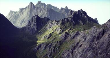 CGI Majestic mountain range with rugged peaks and lush valleys during daylight video