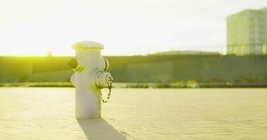 CGI Morning light brightens a fire hydrant near a construction site video