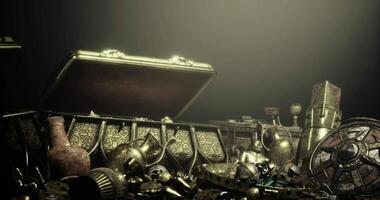 CGI Treasure chest filled with ancient artifacts and valuables in dim light video