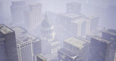 CGI City skyline shrouded in fog with historic building in center video