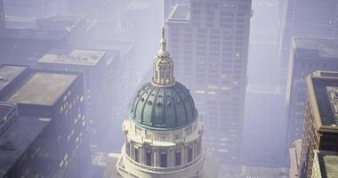 CGI Skyline view of a city with fog enveloping towering buildings and a dome video