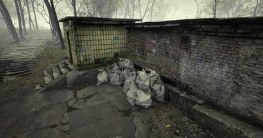 CGI Urban decay showing neglected area with trash bags and cracked pavement video