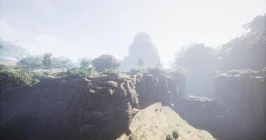 CGI Stunning rocky landscape with mist in a serene natural setting video
