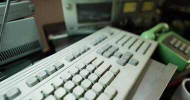 CGI Vintage computer equipment and retro gadgets displayed on a workbench video
