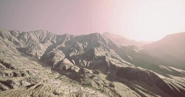 CGI Majestic mountain range under bright sunlight with smooth contours and textures video