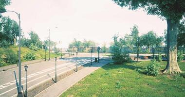 CGI Walking path in a tranquil park surrounded by greenery and light posts video