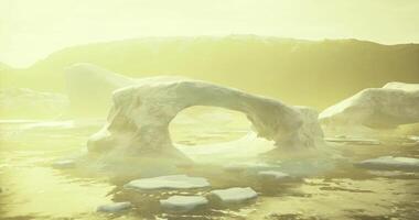 CGI Mysterious ice arch formation in tranquil waters at sunset video