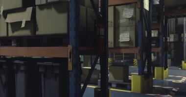 CGI Evening warehouse with stacked crates and storage containers video