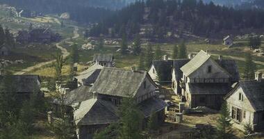CGI Quiet village landscape with rustic houses and natural surroundings in daylight video