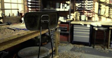 CGI Workbench and tools in a rustic workshop during daylight hours video