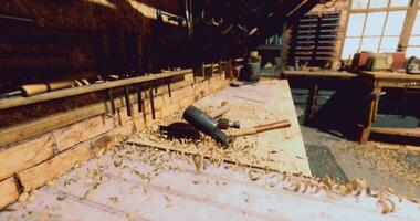 CGI Woodworking tools and shavings in a workshop during daylight hours video