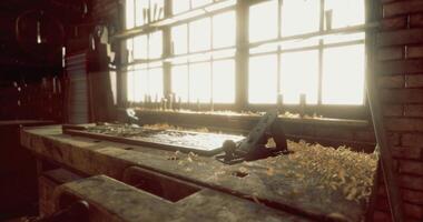 CGI Woodworking workshop illuminated by natural light with tools and shavings video