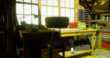 CGI Cozy workshop with wooden desk and tools illuminated by natural light video