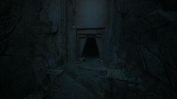 CGI Entrance to an ancient cave nestled in a shadowy cliffside video