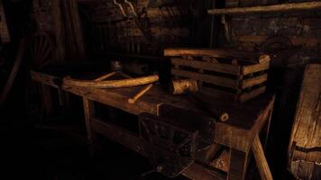 CGI Rustic workshop with wooden tools and crates in dim light video