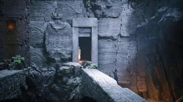CGI Ancient stone structure illuminated by mysterious light in dark cavern video