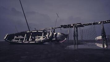 CGI Abandoned wooden boat docked at a misty shore during twilight hours video