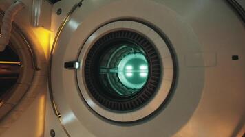 CGI Interior of a space station with circular portal and glowing light in orbit video