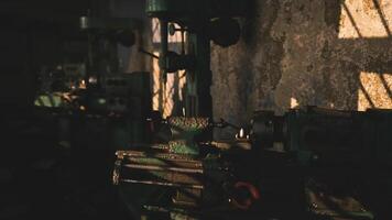 CGI Old machinery illuminated by sunlight in a dusty workshop late in the day video