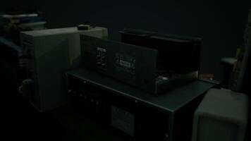 CGI Industrial equipment on a workbench in a dimly lit workshop video