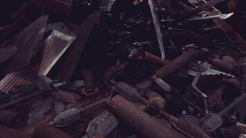 CGI Debris pile of discarded automotive parts in a neglected junkyard setting video