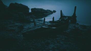 CGI Serene dusk at the shore with abandoned boats under twilight sky video