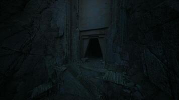 CGI Dark entrance to an ancient cave in a secluded mountain area at night video