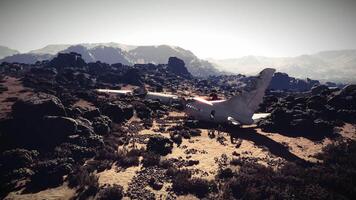 CGI Crash site of an aircraft in a rocky landscape captured in daylight video