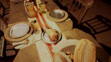 CGI A lavish banquet spread featuring various foods and drinks on a rustic table video