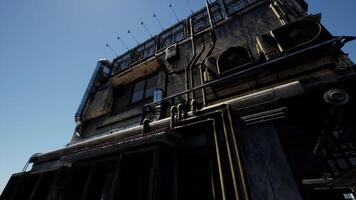 CGI Industrial building with pipes and air conditioning units against clear sky video