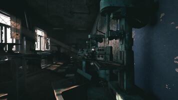 CGI Abandoned industrial workshop with machinery in low light setting video