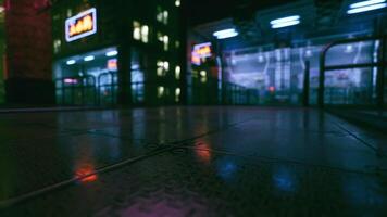 CGI Urban nightlife shows reflections of neon lights on wet pavement at midnight video