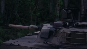 CGI Armored tank positioned among dense jungle foliage during twilight video
